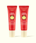 Two Sun Bum Heat Wave tinted lip balms in red tubes with beige caps shown side by side for Tinted Lip Duos.