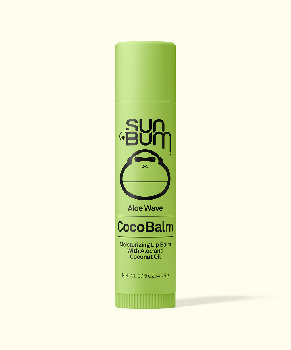 Green tube of Sun Bum CocoBalm on a white background