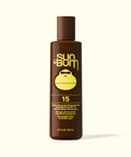 Sun Bum Tanning lotion SPF 15 in brown bottle with yellow logo and text, 8.5 fl oz size